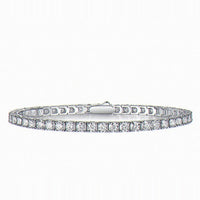 Kouchta Tennis Classique : ligne de moissanites rondes quatre griffes, argent 925 or blanc 18K
