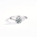 Kouchta — Solitaire six griffes flocon, moissanite 1 carat, argent 925 or blanc 18K